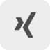 Xing logo showing an abstract “X” shape in dark grey on a pale background.