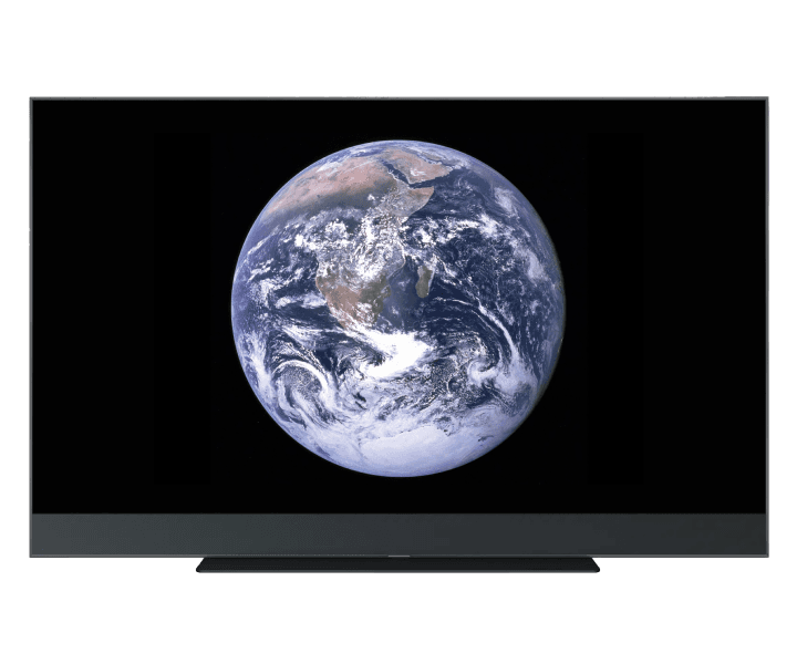 Flat-screen TV displaying a full view of Earth from space, set against a black background.